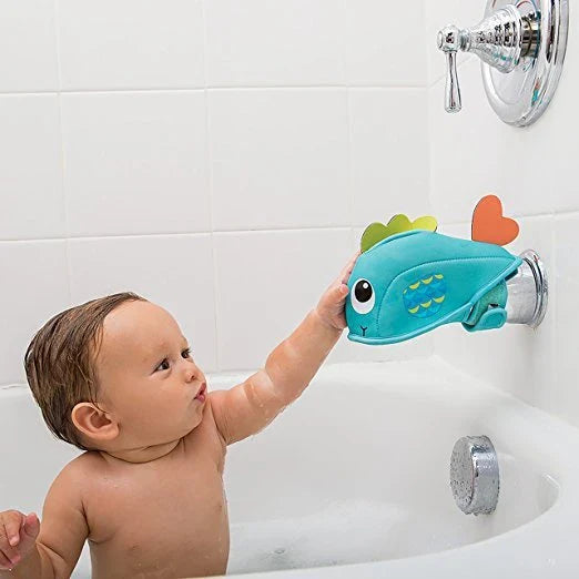 Whale-shaped bath tap safety cover with adjustable closure, designed to protect baby's head during bathtime