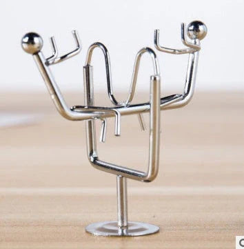 Stainless steel Iron Man tumbler decoration with one-leg balance design