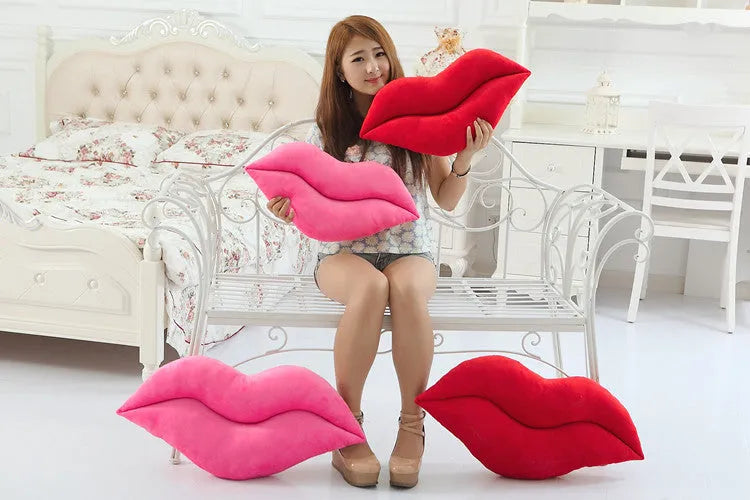 Plush big lips pillow in pink 60 cm tall with short plush fabric on a sofa