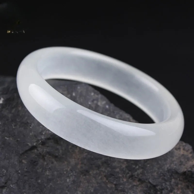 Minimalist jade bracelet in Ice-like White Moonlight colour showing both flat rod and round rod profile options