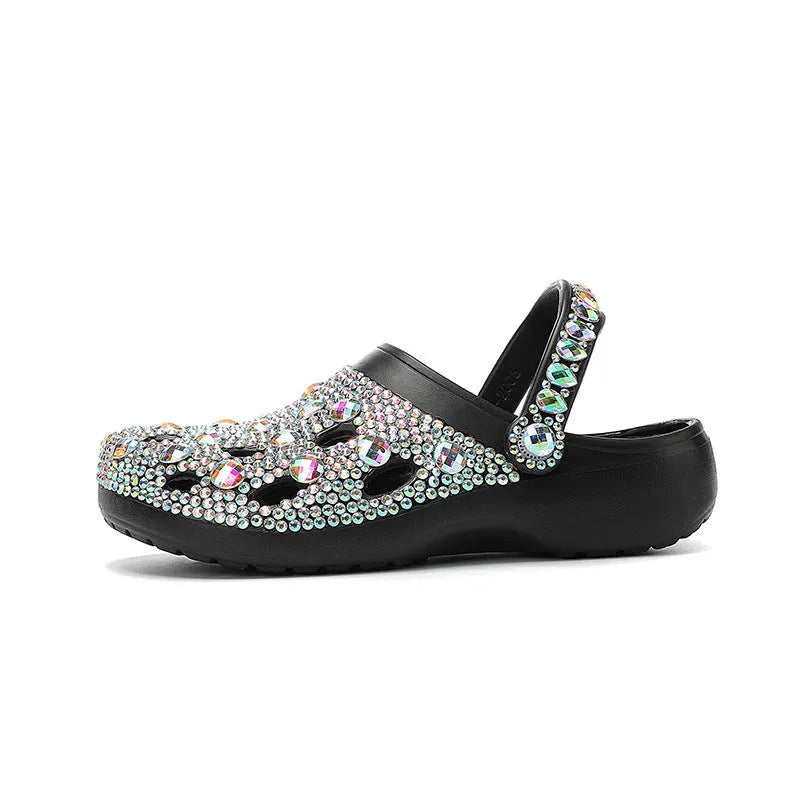 Black women's platform sandals with rhinestone detail on EVA upper and thick sole.