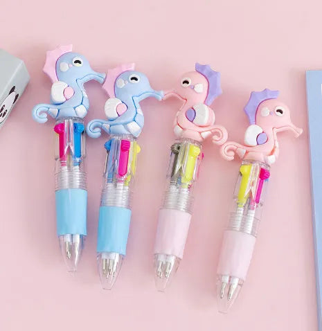 Cartoon-themed four-colour press ballpoint pen with plastic and silicone body and 0.7mm bullet tip