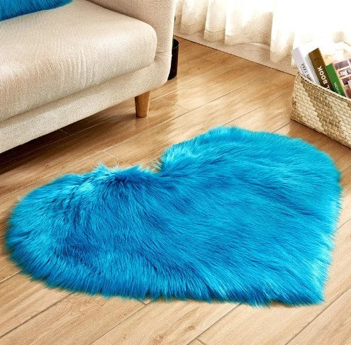 Soft, plush heart-shaped rug in various colors and sizes for comfortable home decor