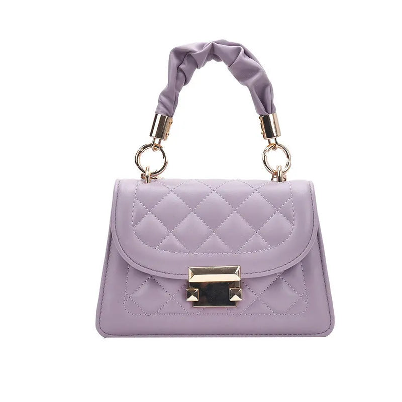 Women's purple rhombus square shoulder bag with crossbody strap showing structured design
