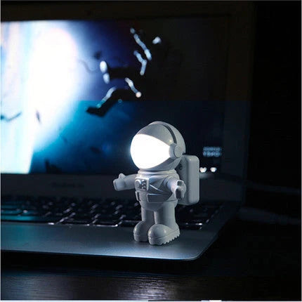 Astronaut USB Desk Lamp with flexible gooseneck arm and unique helmet switch