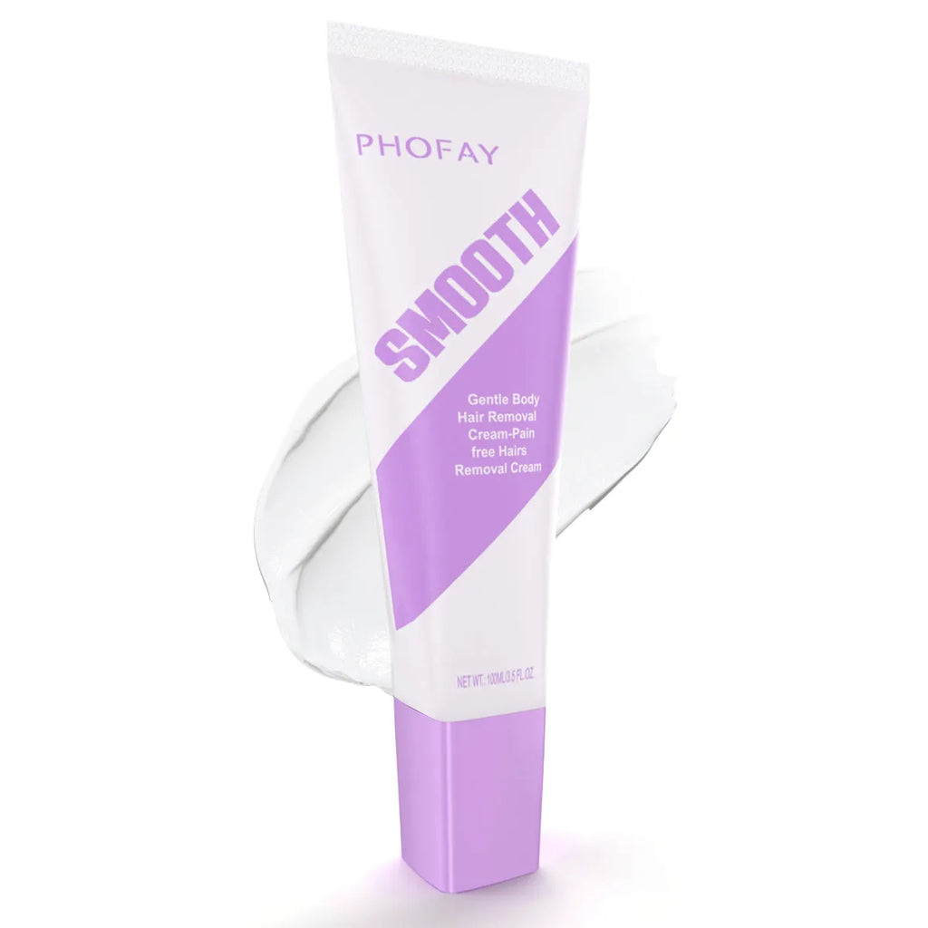 PHOFAY painless hair removal cream tube and included plastic scraper tool on a bathroom surface.