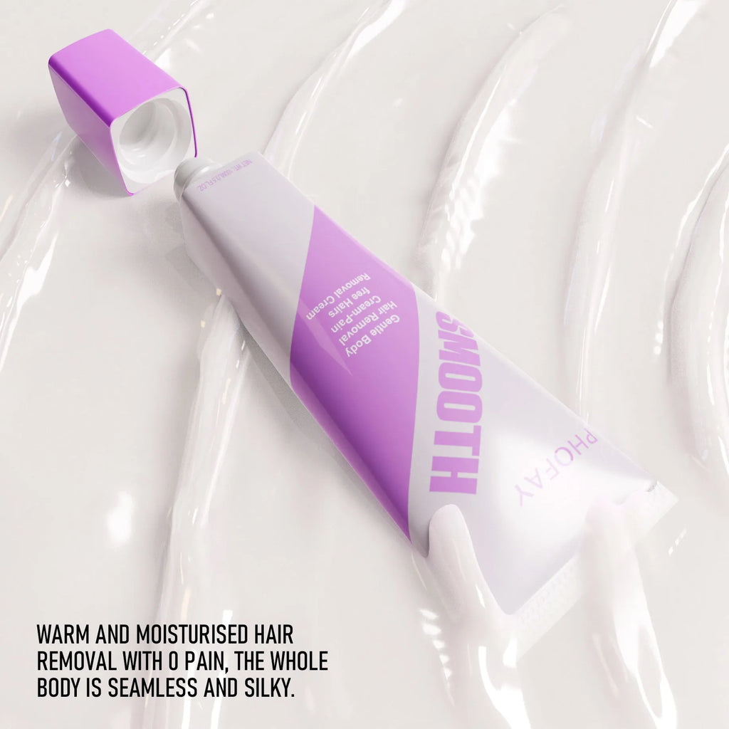 PHOFAY painless hair removal cream tube and included plastic scraper tool on a bathroom surface.