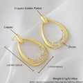Yellow gold geometric drop-shaped women's earrings with round and oval ring elements on a simple background.