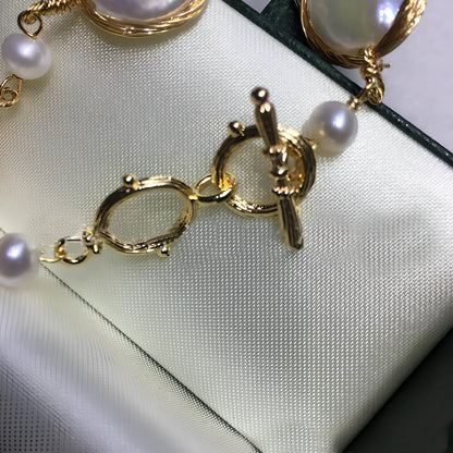 14K gold bracelet with 14mm white button freshwater pearls and baroque texture