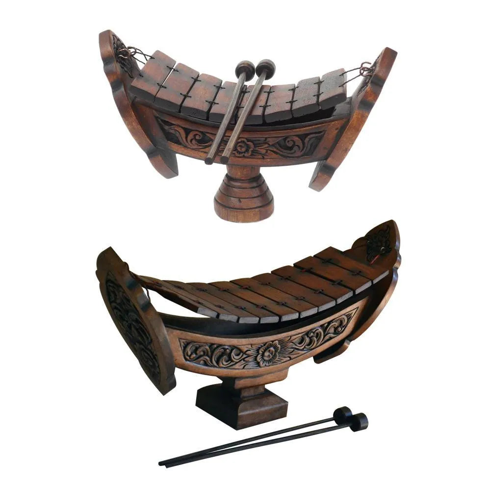Brown wooden hand xylophone decorative pendant measuring 27x16cm in Southeast Asian style