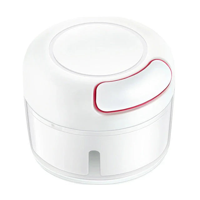 Manual cutting meat grinder with stainless steel blades on a kitchen counter