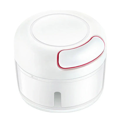 Manual cutting meat grinder with stainless steel blades on a kitchen counter