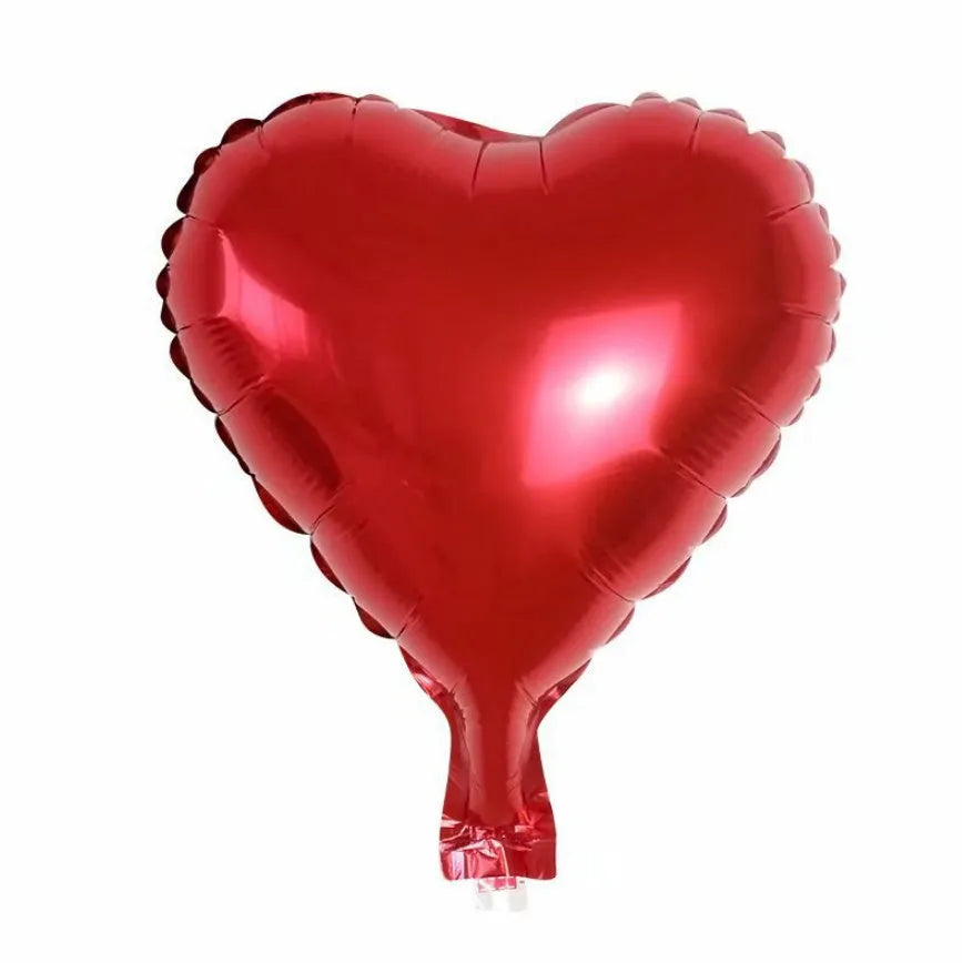 Five peach heart-shaped metallic aluminium balloons in assorted colours on a white background.