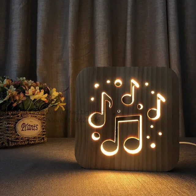 Square pine wood USB LED lamp emitting warm white light on a desk.