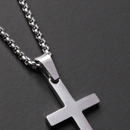 Simple stainless steel cross necklace with adjustable chain, perfect for everyday wear