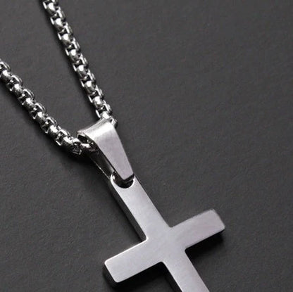 Simple stainless steel cross necklace with adjustable chain, perfect for everyday wear