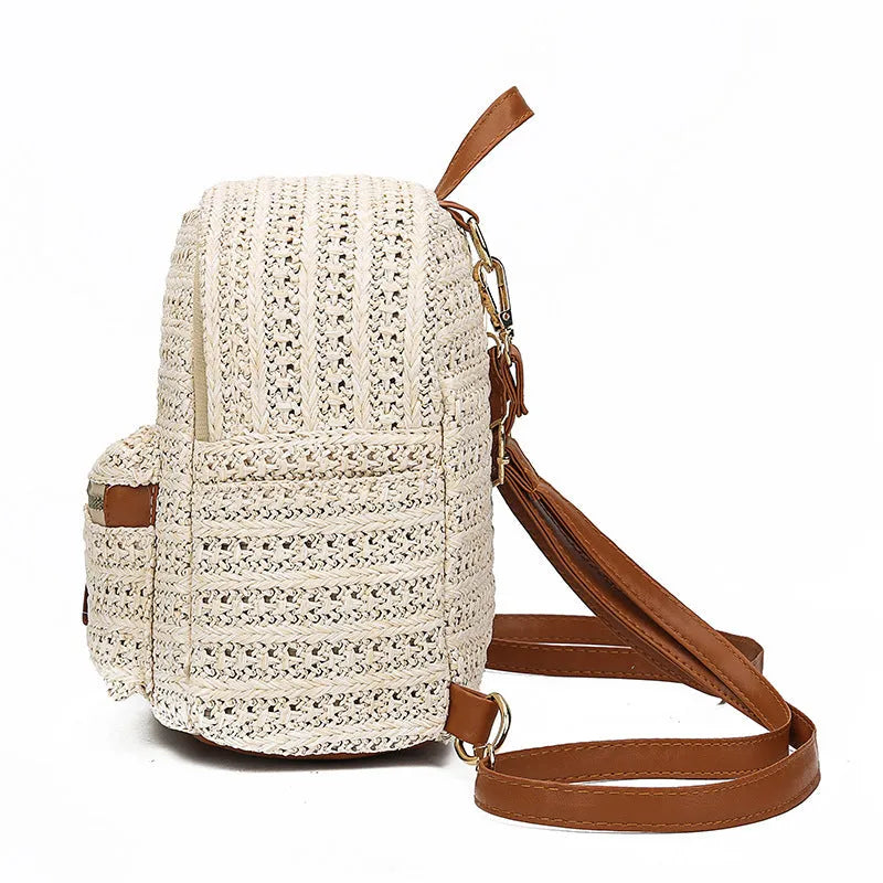 Handwoven straw backpack in beige white, 20x15x21cm, open-top design, lightweight natural fibre for casual beach travel use