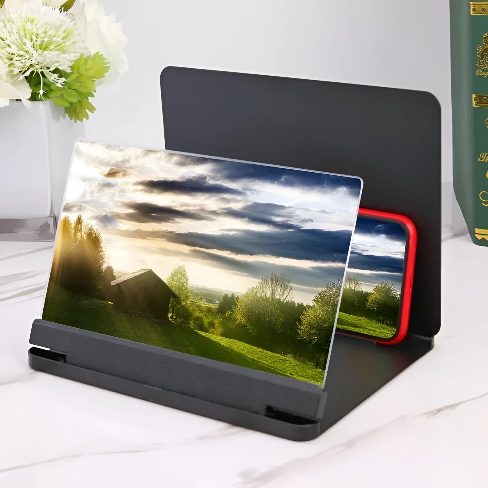 Black portable phone screen amplifier with integrated smartphone holder showing 9-inch plexiglass screen