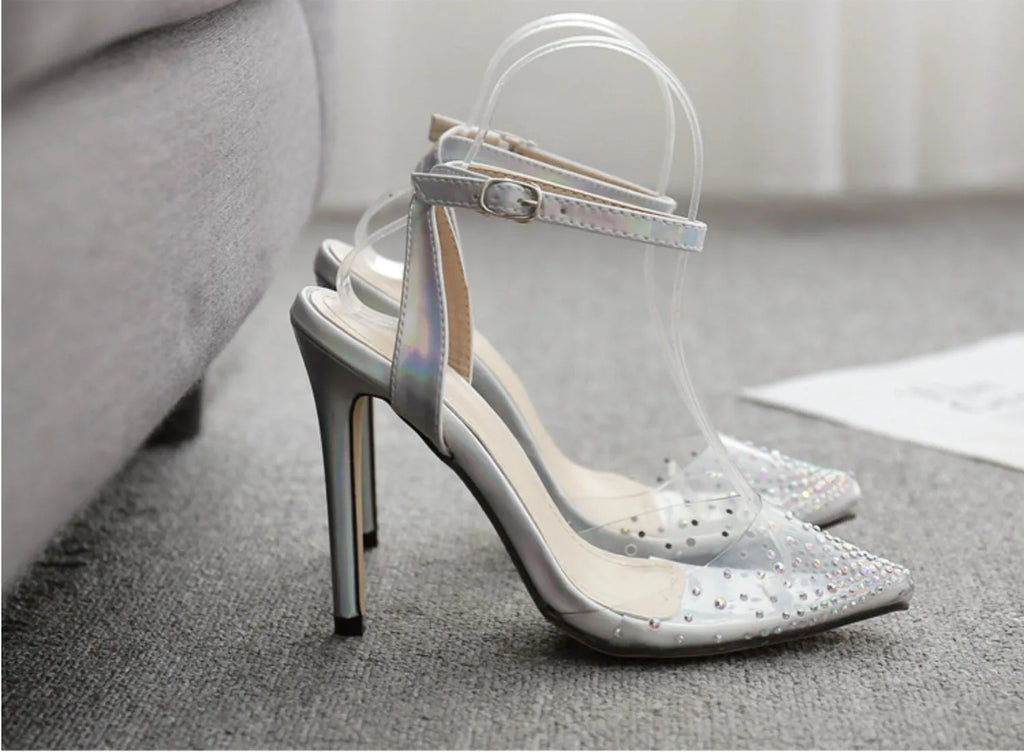 Women's pointed toe diamond embellished sandals with a stiletto heel on a white background.