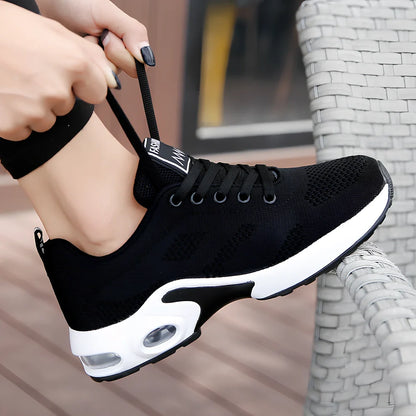 Women's lightweight leisure sports shoes in black with mesh upper and air cushion sole, sizes 35-44