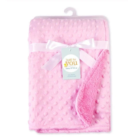 Soft and cozy baby blanket in various colors, including white, blue, gray, purple, green, and pink, with a plush, short-pile fabric and luxurious lamb velvet backing