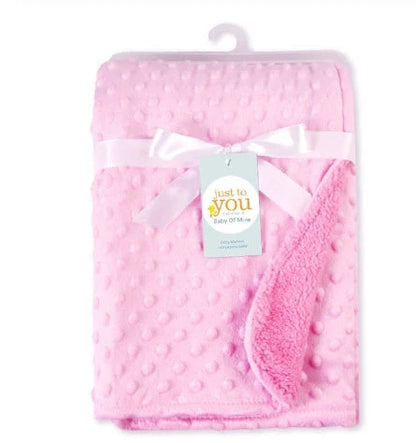 Soft and cozy baby blanket in various colors, including white, blue, gray, purple, green, and pink, with a plush, short-pile fabric and luxurious lamb velvet backing