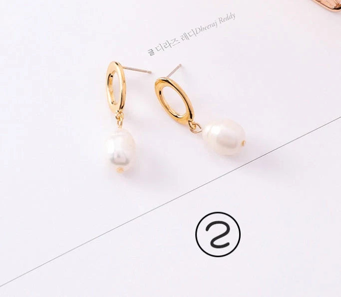 Vintage geometric pearl asymmetric earrings with 925 silver hooks, perfect for adding elegance to any outfit.