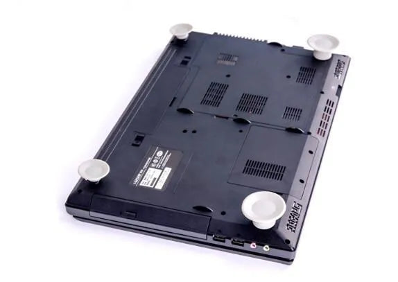 Grey durable plastic laptop cooling pad kit with two large and two small non-slip pads.