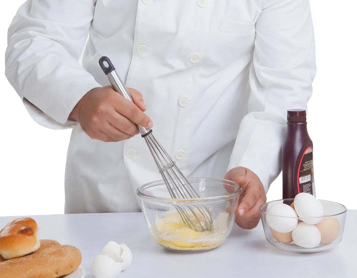 White 500W electric hand mixer with two metal beaters and turbo button