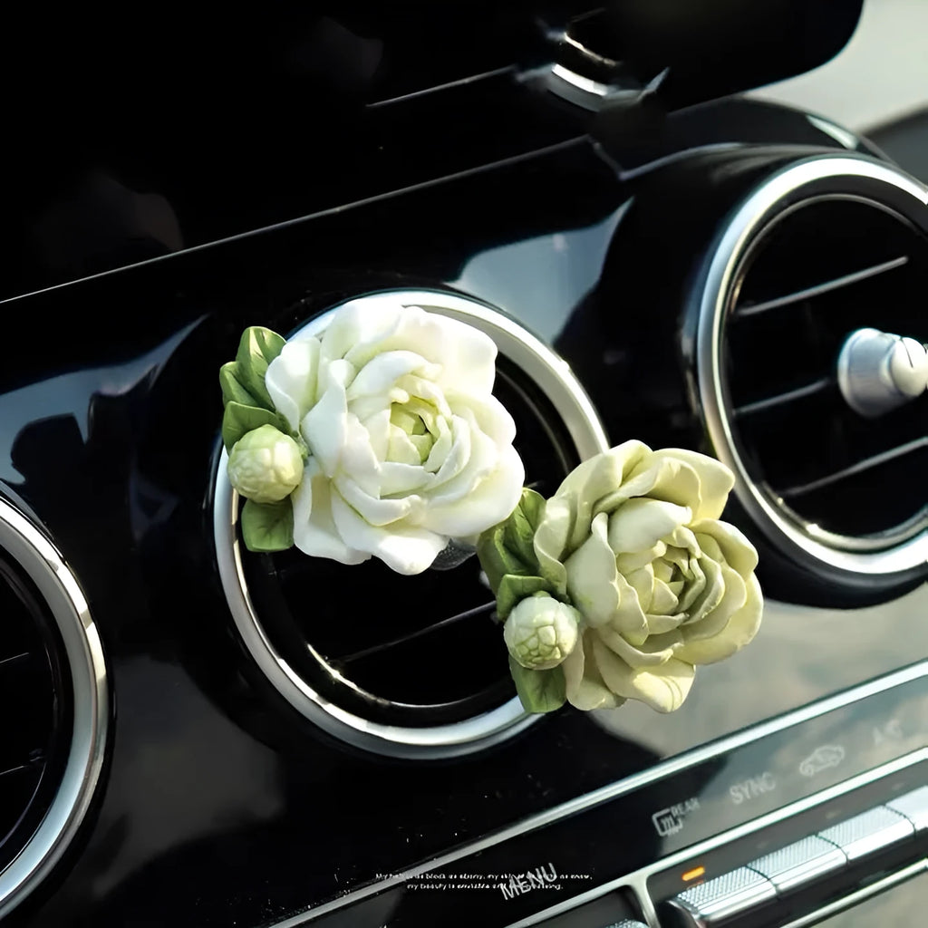 Gypsum solid car air freshener with jasmine oil clipped to vehicle vent