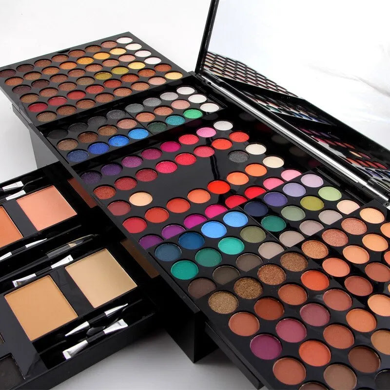 Piano-shaped box open to show 180 colour eyeshadow palette with blushes and contour powders