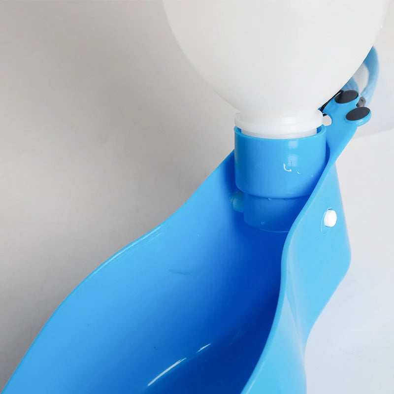 Portable pet cup drinker in pink, 600ML capacity, with one-hand operation for easy pet hydration