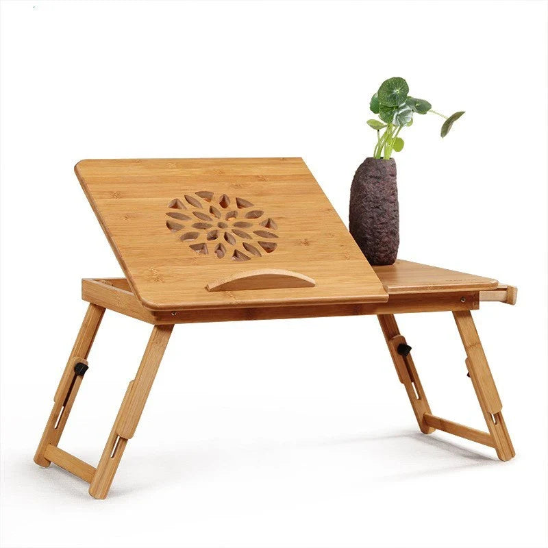 Foldable laptop bed desk with storage drawers and small fan, made from natural bamboo