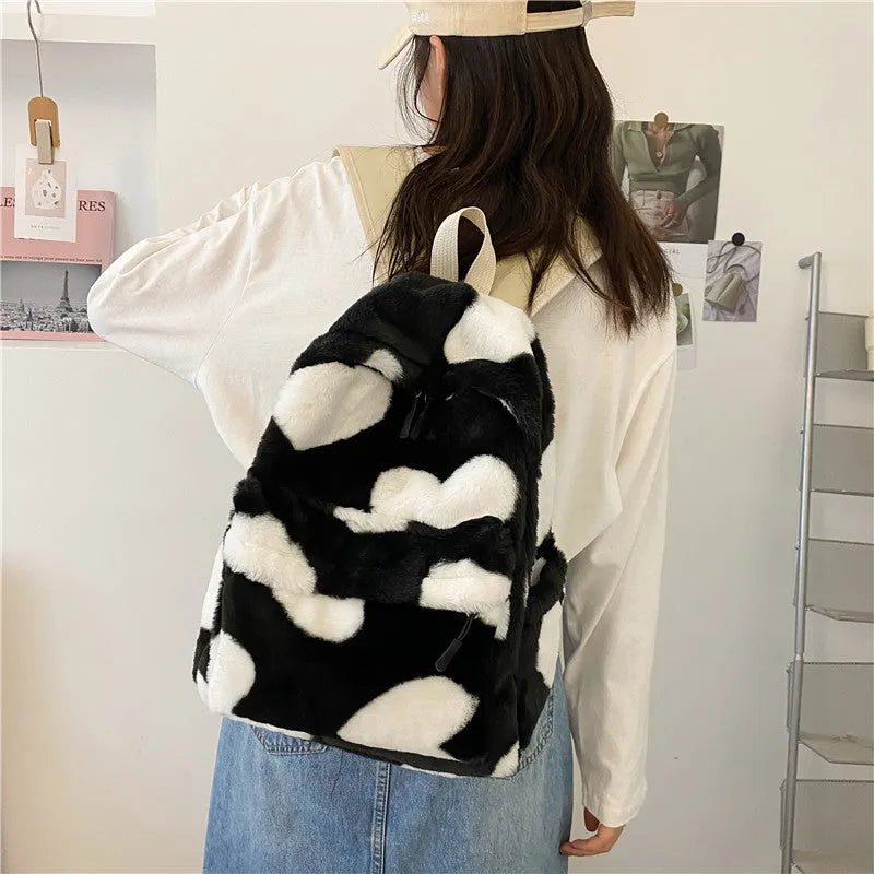 Plush furry backpack in khaki with heart-shaped pattern and front pocket, soft daypack for women