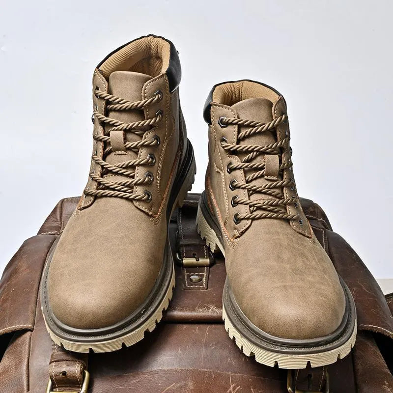Genuine leather men's mid-top Martin boots in brown with stitched rubber sole and mesh fabric panels