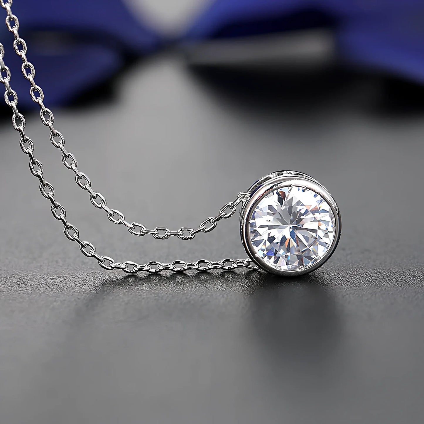 Bride and bridesmaid fashion jewellery set featuring diamond-treated pendant and matching earrings for wedding coordination