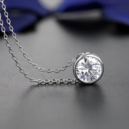 Bride and bridesmaid fashion jewellery set featuring diamond-treated pendant and matching earrings for wedding coordination