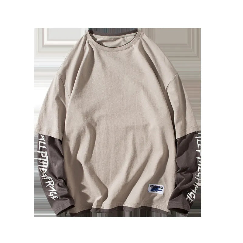 Fake two printed round collar cotton blend t-shirts in black, light grey, and white on a neutral background