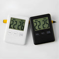 Black and white kitchen timer with LCD display and magnetic back for cooking