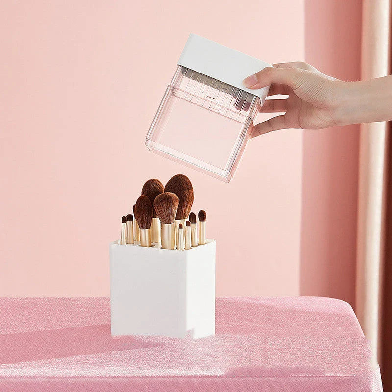 Inverted makeup brush storage bucket in white, blue, and pink for organised dressing tables