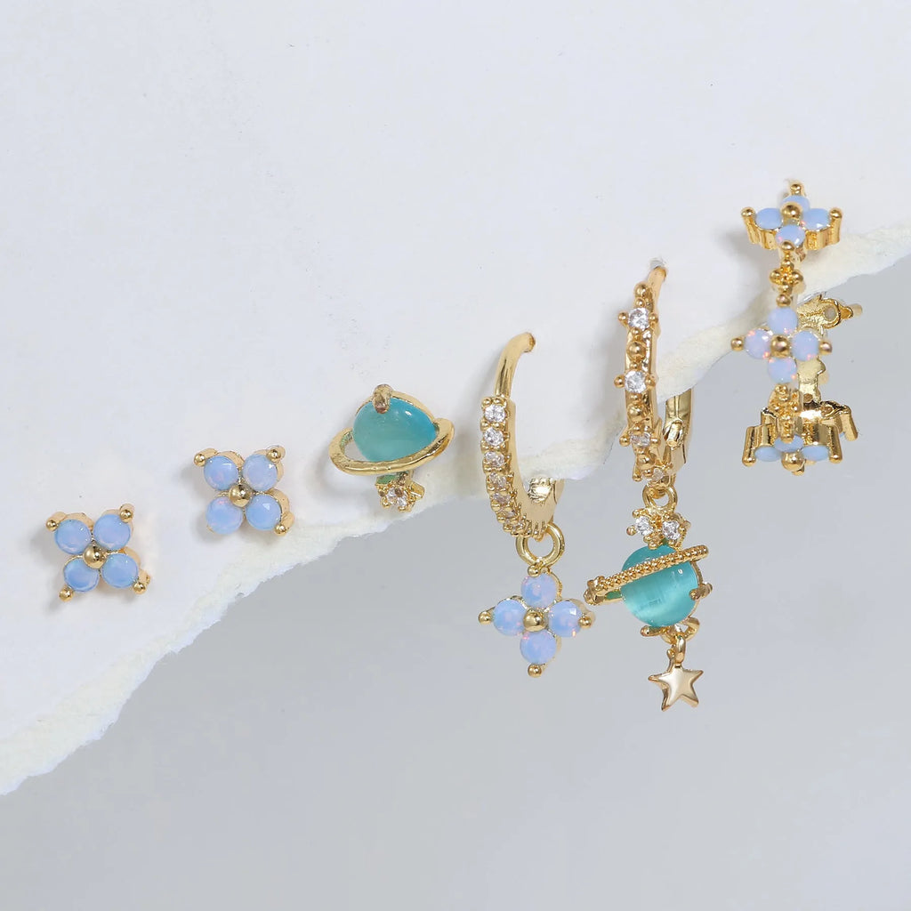 Gold and silver flower stud earrings with blue protein flower nail and zircon mosaic design.