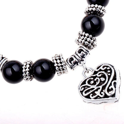 Seven Chakra Yoga Energy Bracelet with adjustable length for spiritual alignment