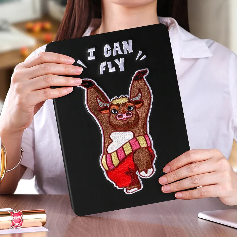 Cartoon design imitation leather silicone protective sleeve for Apple iPad with included screen protector.