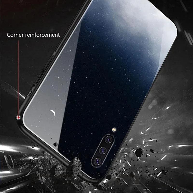 A black silicone protective case for a smartphone, shown next to a navy blue version.