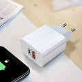 USB travel charger with bare metal casing and multiple outlet options for international use