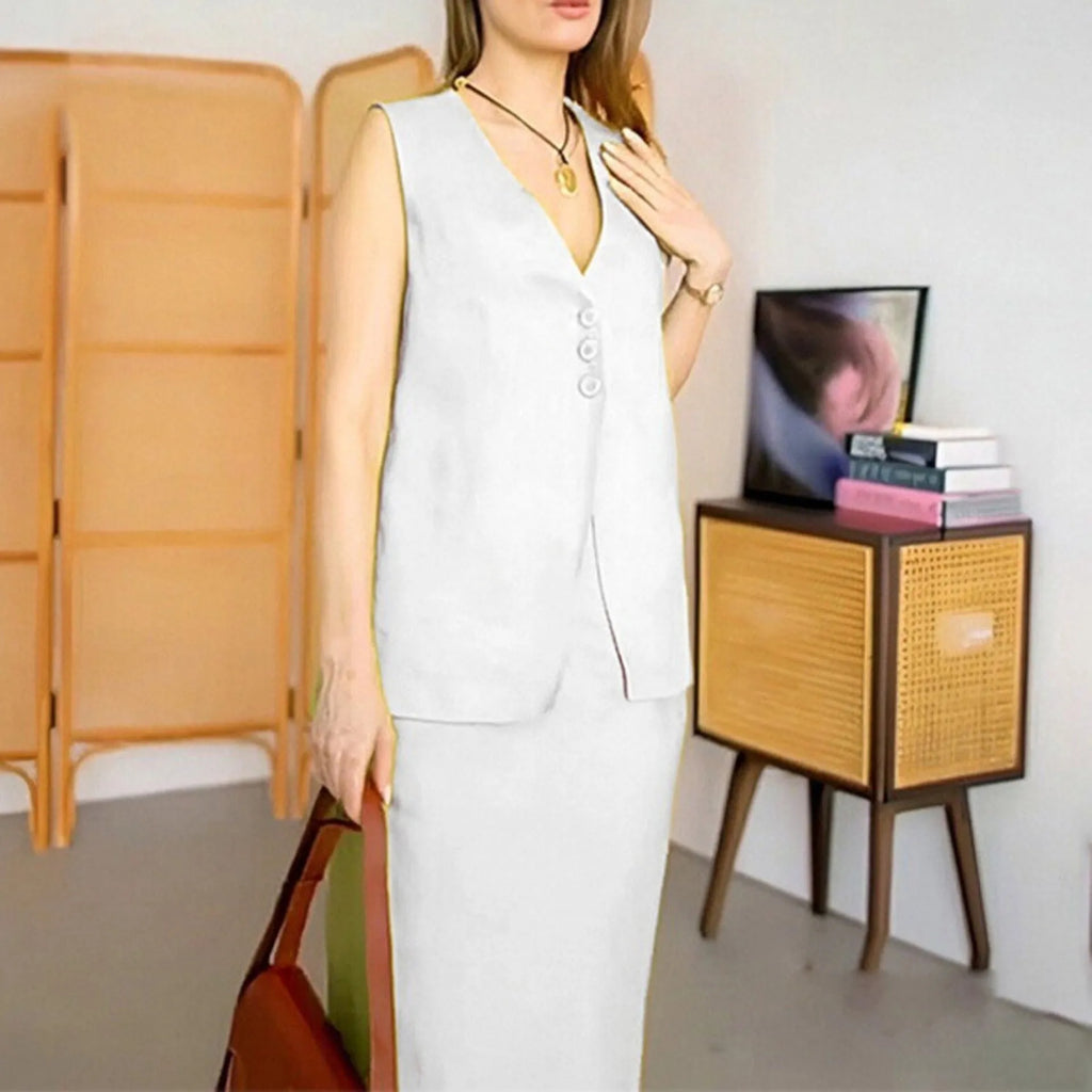 White sleeveless top and long skirt two-piece casual suit set on a model.