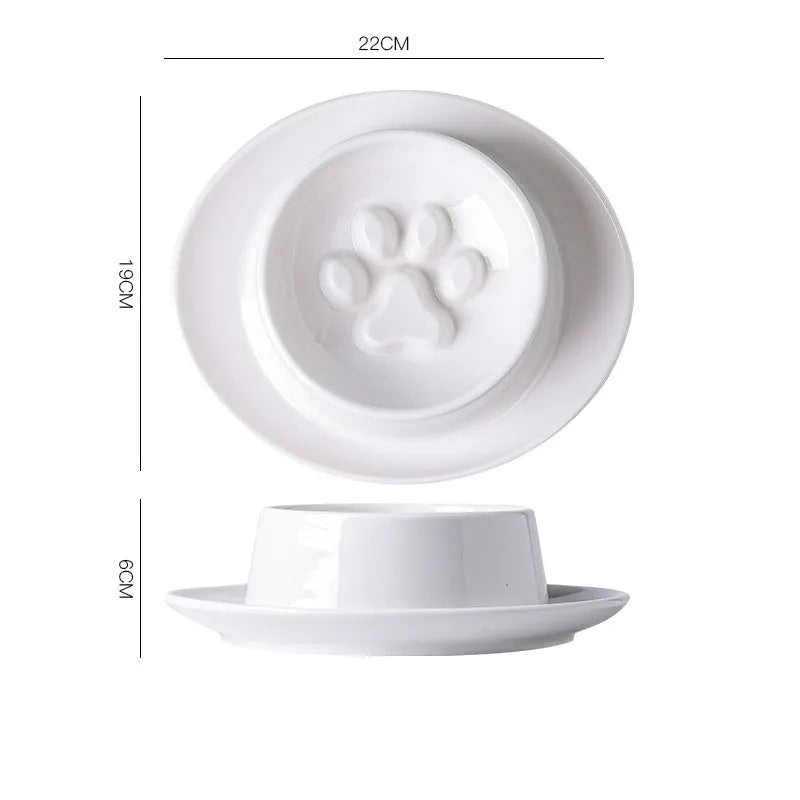 Ceramic slow feed pet bowl in green with internal ridges and neck protection design.