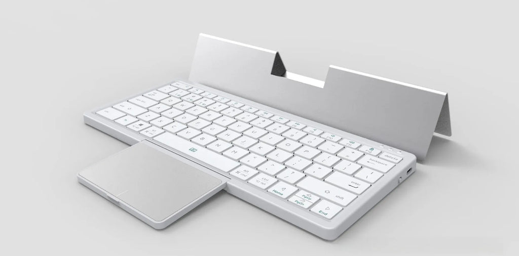 Black and grey wireless Bluetooth keyboard with touchpad next to its leather sheath stand.