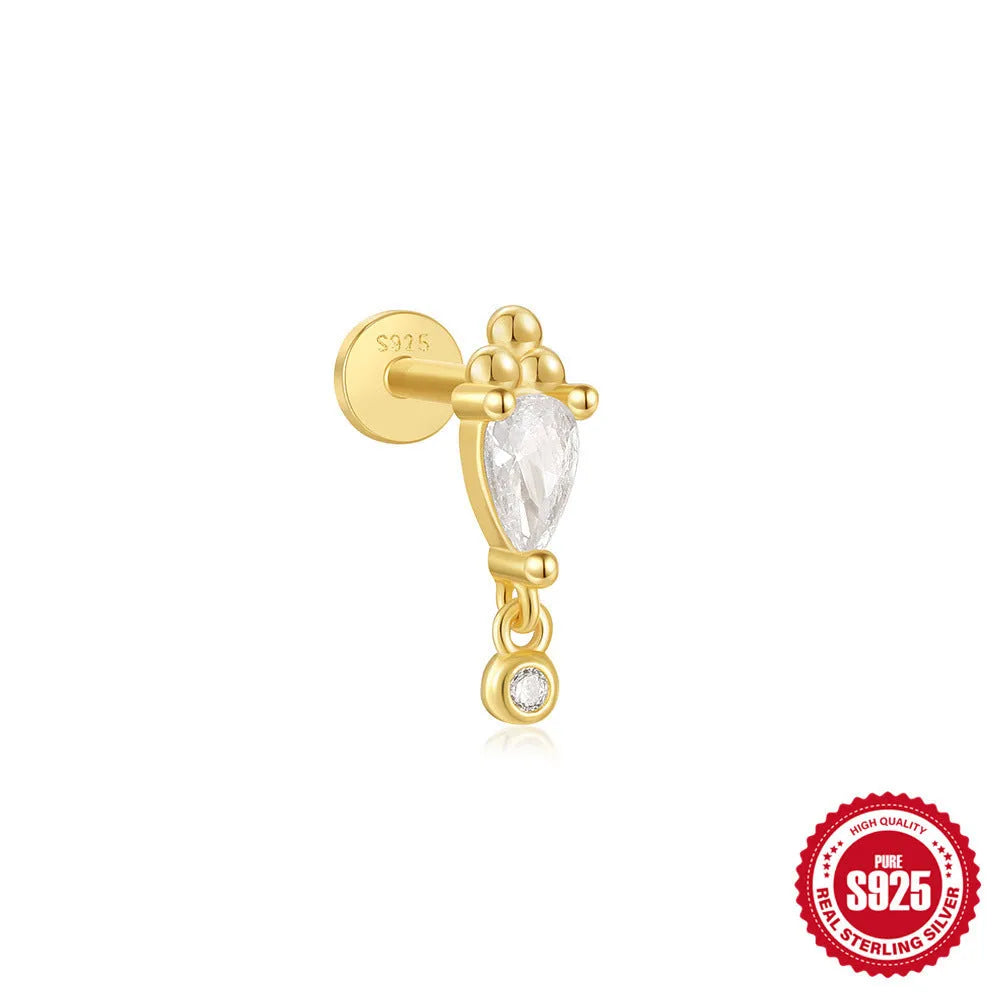 Sterling silver ear stud with a gold electroplated XINGX inlaid tassel design.