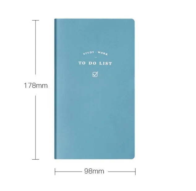 Simple Style 48K PU cover todolist notebook open on a desk, showing Macaron Yellow colour and lined writing paper.